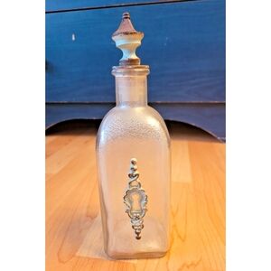Decorative painted bottle with keyhole detail